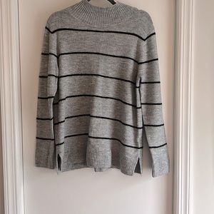 Black and metallic gold striped mock neck sweater